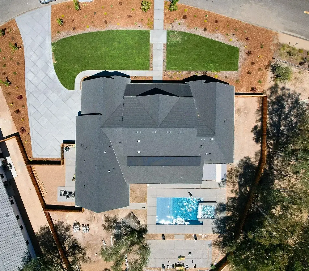 Parcel 1 user-supplied finished-home reference — overhead home and pool view, not a view of this parcel