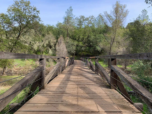 New York Creek bridge pictured in California State Parks’ regional Browns Ravine trail information